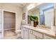 Bathroom with double vanity, a closet, and a shower with glass doors at 3102 Castlerock Dr # 2, Burlington, NC 27215