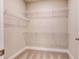 Walk-in closet equipped with wire shelving for organized storage at 3102 Castlerock Dr # 2, Burlington, NC 27215
