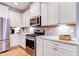 Stylish kitchen features granite countertops and stainless steel appliances at 3102 Castlerock Dr # 2, Burlington, NC 27215