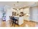Modern kitchen with granite countertops, island seating, and stainless steel appliances at 3102 Castlerock Dr # 2, Burlington, NC 27215