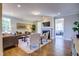 Bright and airy living room featuring hardwood floors, fireplace, comfortable seating, and natural light at 3102 Castlerock Dr # 2, Burlington, NC 27215