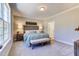 Spacious main bedroom with a bench seat and comfortable furniture at 3102 Castlerock Dr # 2, Burlington, NC 27215