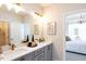 Modern bathroom with double vanity and elegant fixtures at 1005 Bridgeforth Ln, Chapel Hill, NC 27517