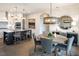 Elegant dining room with a round table and access to the kitchen at 1005 Bridgeforth Ln, Chapel Hill, NC 27517