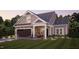 Craftsman style home with stone accents and a 2-car garage at 1005 Bridgeforth Ln, Chapel Hill, NC 27517
