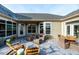 Spacious paved patio with comfortable seating at 1005 Bridgeforth Ln, Chapel Hill, NC 27517
