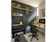 Contemporary home office featuring built-in shelving, and a modern workspace perfect for productivity at 106 Broadway St # 106, Durham, NC 27701