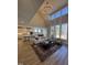 Bright living room with high ceilings and large windows to give a view of the outside at 1000 Azalea Garden Circle, Raleigh, NC 27603