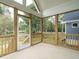 This screened porch is spacious and is ideal for entertaining guests at 1000 Azalea Garden Circle, Raleigh, NC 27603