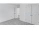 Clean, airy bedroom with neutral paint, carpet, and two closets for ample storage space at 736 Heathered Farm Way, Apex, NC 27523