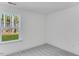 Sunlit bedroom featuring a large window, neutral paint, and plush carpet at 736 Heathered Farm Way, Apex, NC 27523