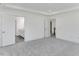 Spacious main bedroom with ensuite bathroom and carpet flooring at 736 Heathered Farm Way, Apex, NC 27523
