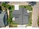 An aerial view showcasing the home's roof, landscaping, and backyard layout, and surrounding neighborhood at 1000 Marilyn Dr, Raleigh, NC 27607