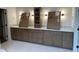 Bathroom vanity with granite countertop and wooden cabinets at 1000 Marilyn Dr, Raleigh, NC 27607