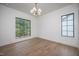Bright bedroom with large windows and hardwood floors at 1000 Marilyn Dr, Raleigh, NC 27607