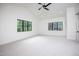 Bright, large bedroom featuring soft carpeting, high ceiling and windows with natural light at 1000 Marilyn Dr, Raleigh, NC 27607
