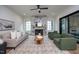 Living room featuring a marble fireplace and large windows, creating a cozy and inviting atmosphere at 1000 Marilyn Dr, Raleigh, NC 27607