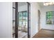An office featuring a modern aesthetic, with a large window and a view at 1000 Marilyn Dr, Raleigh, NC 27607