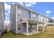 Home exterior showcasing a covered patio and fenced backyard at 9228 Kitchin Farms Way # 412, Wake Forest, NC 27587