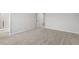 Carpeted bedroom with neutral decor and ample closet space at 9228 Kitchin Farms Way # 412, Wake Forest, NC 27587