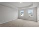Spacious bedroom with neutral walls and carpet flooring at 9228 Kitchin Farms Way # 412, Wake Forest, NC 27587