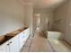 Bathroom with a tiled shower area and vanity, providing a functional and stylish space at 155 Gaines Trl, Pittsboro, NC 27312