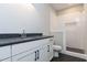 This bathroom features a stylish vanity, contemporary fixtures, and tiled shower with a built-in niche at 155 Gaines Trl, Pittsboro, NC 27312
