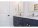 Modern bathroom featuring a dual sink vanity with stone countertop and stainless steel hardware at 155 Gaines Trl, Pittsboro, NC 27312