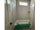 Bathroom featuring a tub and shower with white subway tiles and chrome fixtures at 155 Gaines Trl, Pittsboro, NC 27312