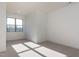 A bright bedroom with ample sunlight and neutral carpeting, creating a serene and inviting atmosphere at 155 Gaines Trl, Pittsboro, NC 27312