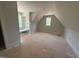 A bedroom featuring a built-in window seat and bookshelf by a bright window at 155 Gaines Trl, Pittsboro, NC 27312