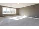 A bright bedroom with large windows offers plenty of natural light and a calming atmosphere at 155 Gaines Trl, Pittsboro, NC 27312