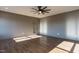 A spacious bonus room features hardwood floors, a ceiling fan, and a glass-paned door at 155 Gaines Trl, Pittsboro, NC 27312