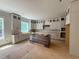 Unfinished kitchen with gray cabinets and island, awaiting final touches at 155 Gaines Trl, Pittsboro, NC 27312