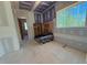 Living room with fireplace under construction with a nice window view at 155 Gaines Trl, Pittsboro, NC 27312