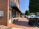 Picturesque street view of local businesses with brick sidewalks and ample parking at 155 Gaines Trl, Pittsboro, NC 27312