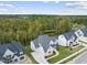 Aerial view of three houses in a neighborhood setting at 2518 Silas Peak Ln, Apex, NC 27523