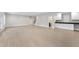 Large, open basement with LVP flooring and a wet bar at 2518 Silas Peak Ln, Apex, NC 27523