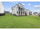 Two story house with screened porch and landscaped yard at 2518 Silas Peak Ln, Apex, NC 27523