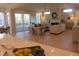 Open living room with hardwood floors and fireplace at 2518 Silas Peak Ln, Apex, NC 27523