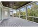 Screened porch with gray composite deck and wooded views at 2518 Silas Peak Ln, Apex, NC 27523