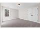 Spacious bedroom with carpeted floors, neutral walls, and a double door closet at 106 Wichita Way, Louisburg, NC 27549