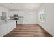 Bright dining area with hardwood floors and large window at 148 Harmony Trl, Broadway, NC 27505