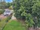 Aerial view of a property with lush greenery in a tranquil neighborhood setting at 918 N Blount St, Raleigh, NC 27604