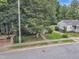 Street aerial view features houses with greenery in a peaceful residential neighborhood at 918 N Blount St, Raleigh, NC 27604
