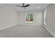 Bright and airy bedroom with large windows and carpet at 114 Slocum Dr, Wendell, NC 27591