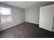 Bedroom with carpet flooring and large window at 106 Burnello Ct, Princeton, NC 27569