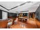 Spacious game room featuring a pool table, bar area, and stylish decor for entertainment at 1820 Oatlands Court Ct, Wake Forest, NC 27587