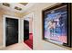 Hallway featuring a framed poster and dark-painted doors and trim at 1820 Oatlands Court Ct, Wake Forest, NC 27587