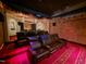 Lavish home theater offering plush reclining chairs and high-end visual and audio at 1820 Oatlands Court Ct, Wake Forest, NC 27587